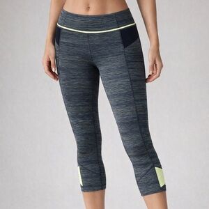 Lululemon grey and neon pace rival crop leggings